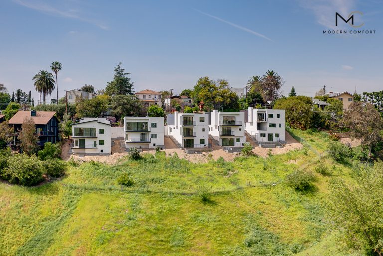 Row of newly built modern homes on a Los Angeles hillside