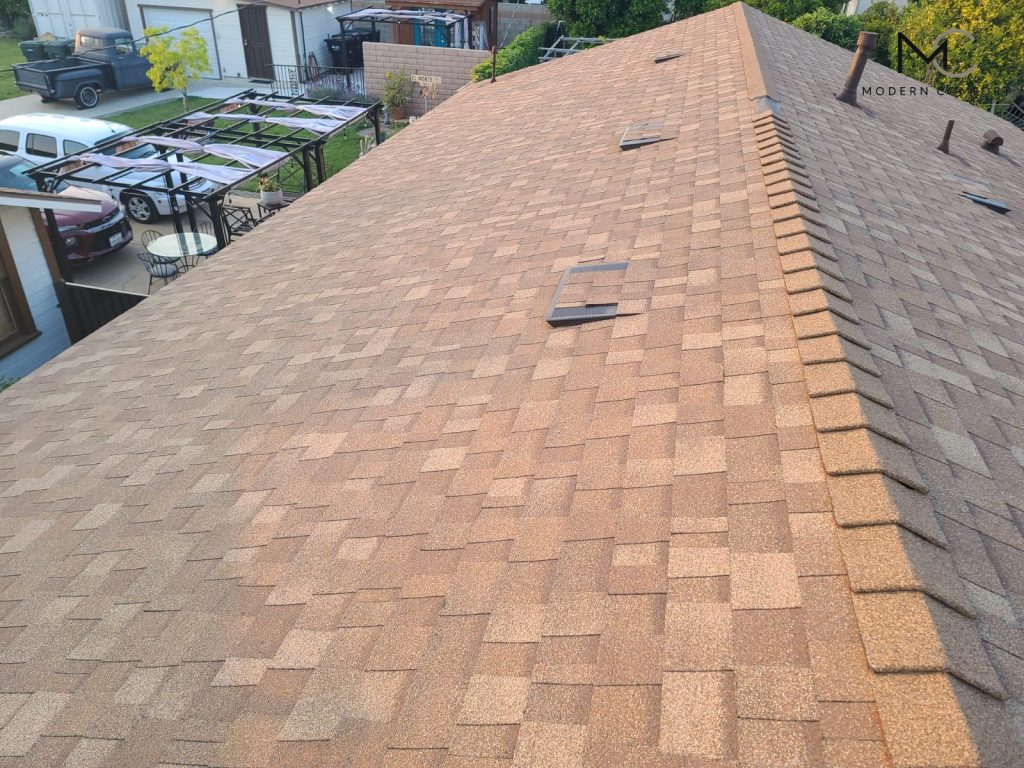 Completed asphalt shingle roof replacement on a residential home